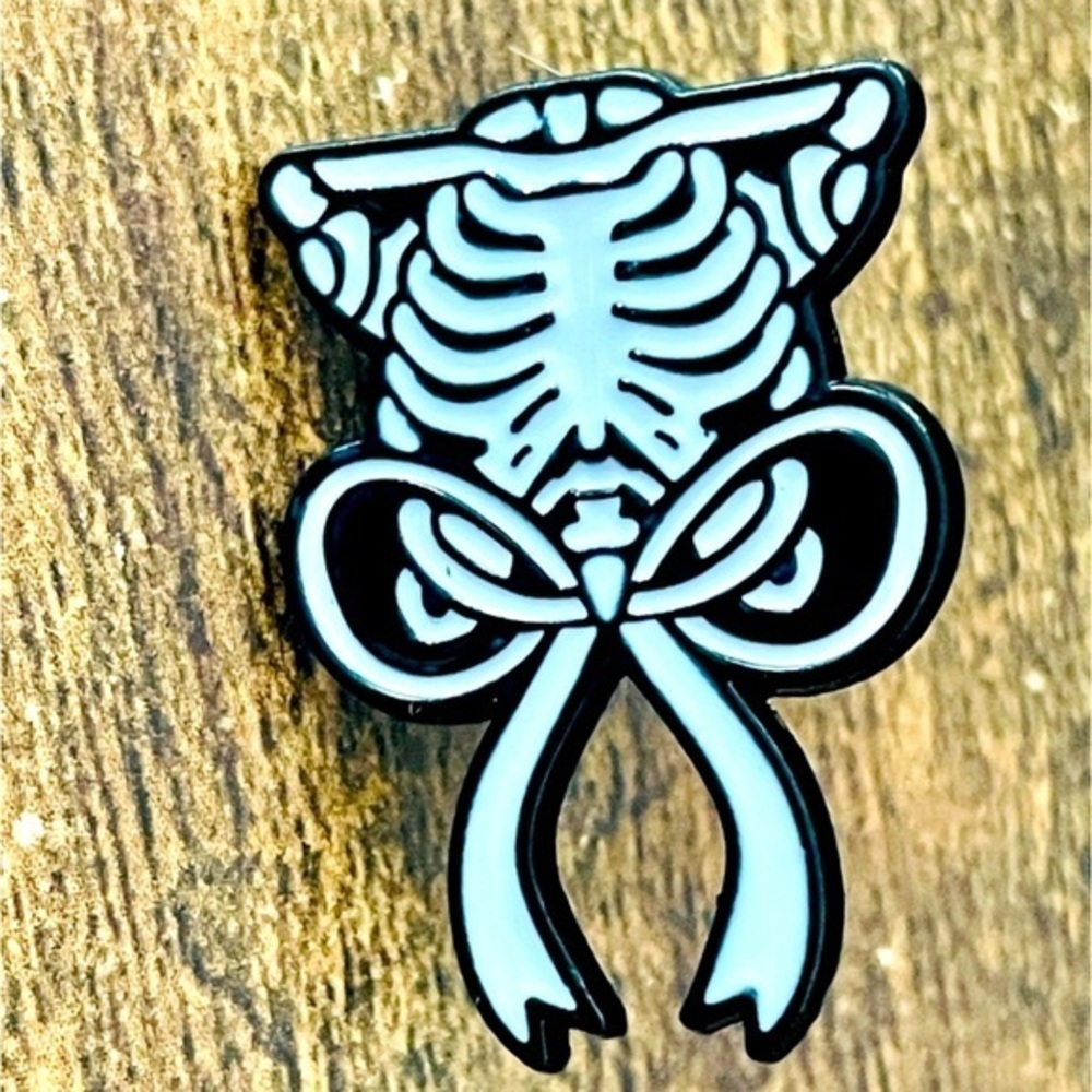 Rib Cage and Bow Enamel Pin, NWT